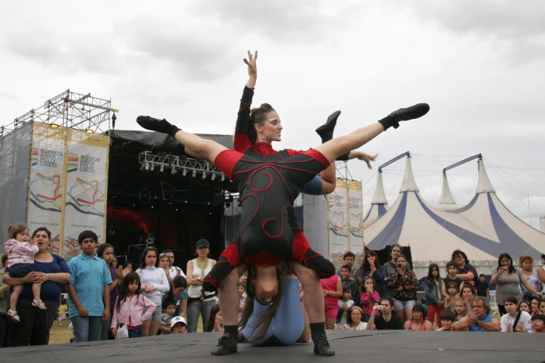 a couple of people dancing on a stage