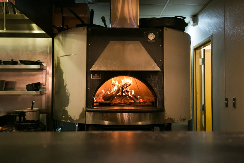 a very big oven with some cooking stuff in it