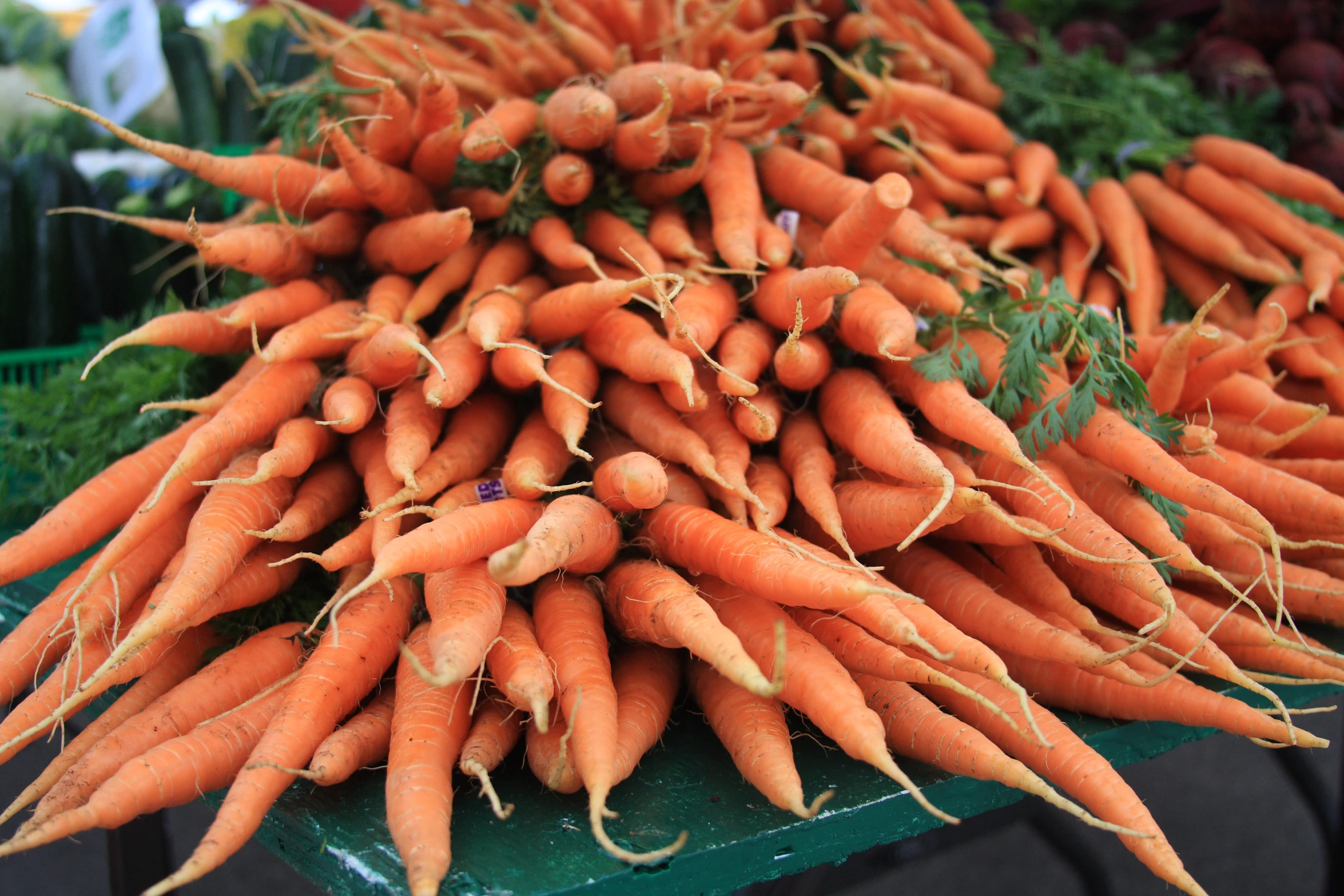 many pieces of carrots are piled together