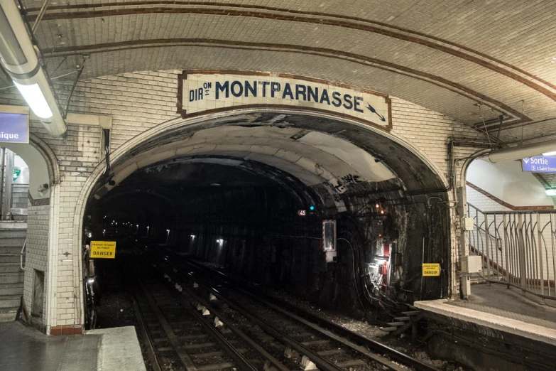 the view into a train tunnel during the day