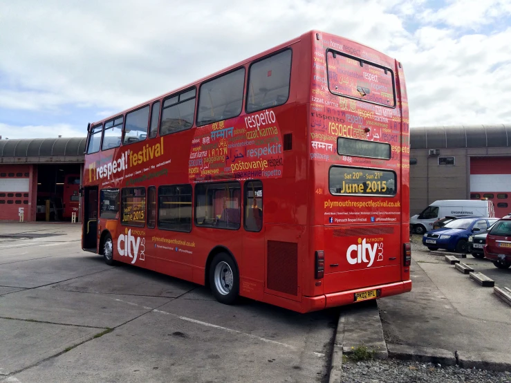 a double decker bus is parked at a parking lot