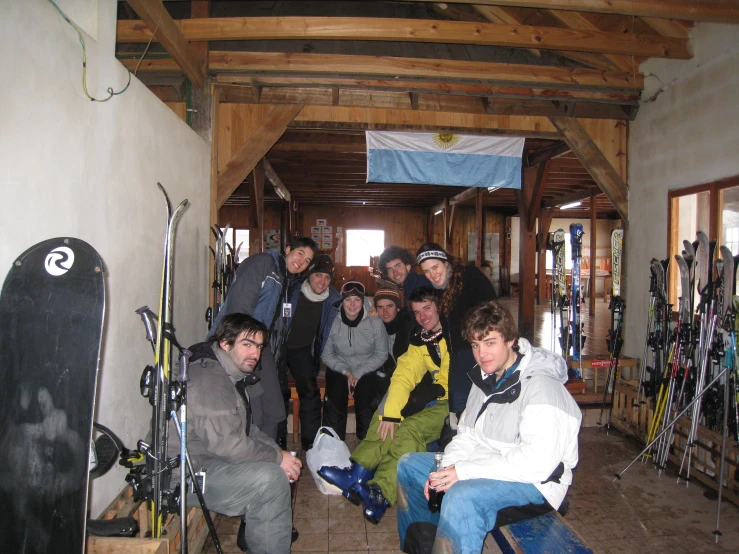 some people with skis in a small room