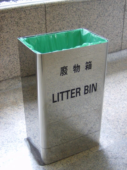 a paper bin with some writing in it