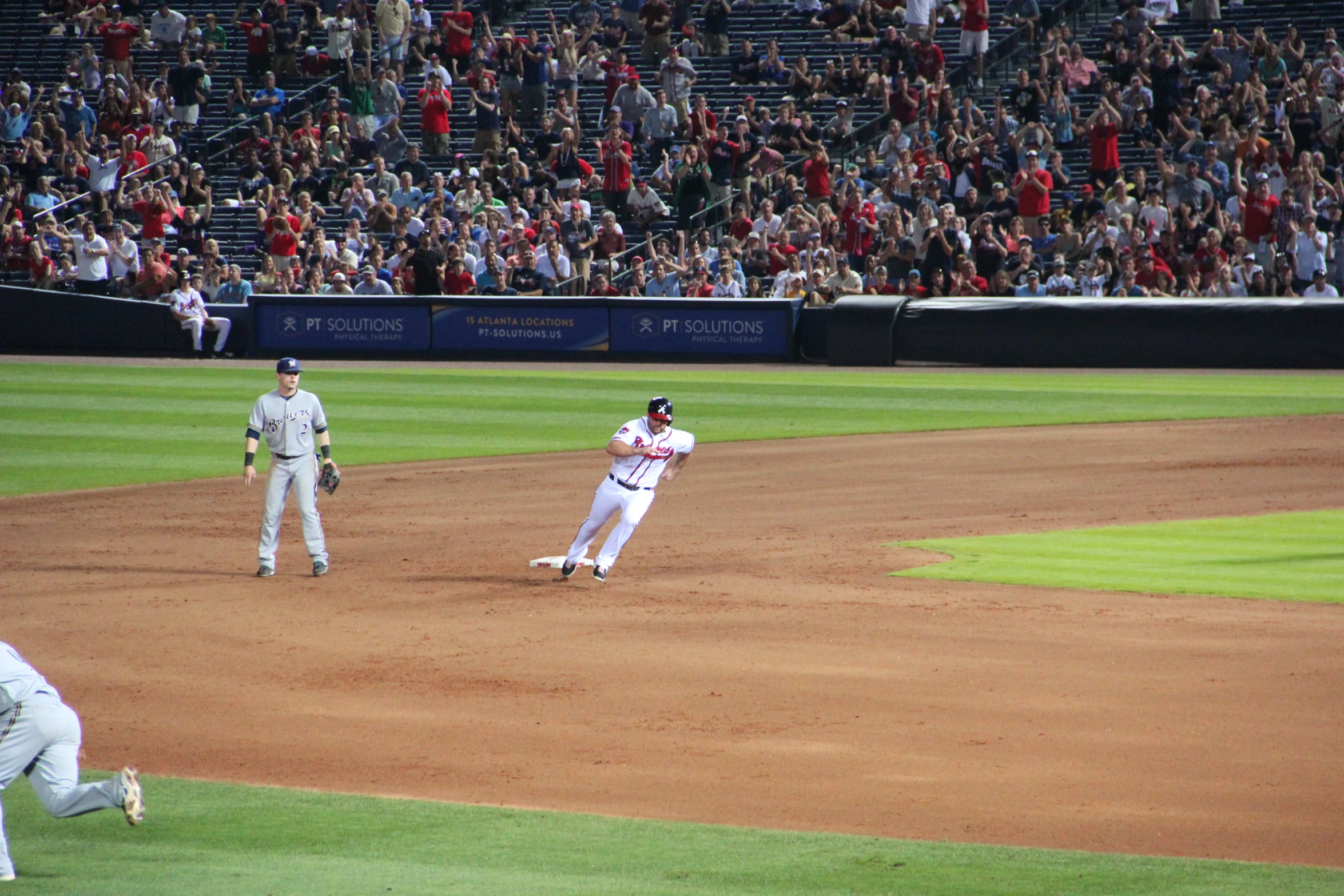 a group of men on a field playing baseball