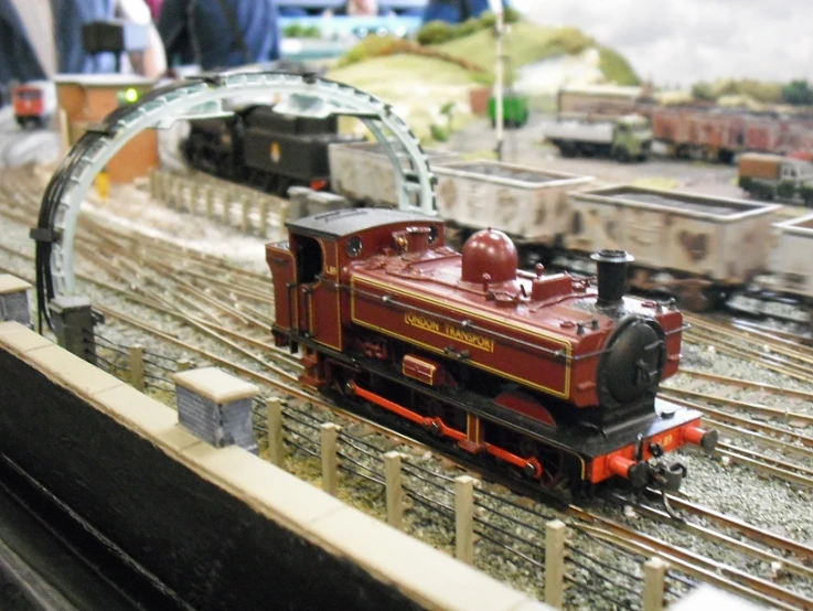 a small model train that is on the tracks