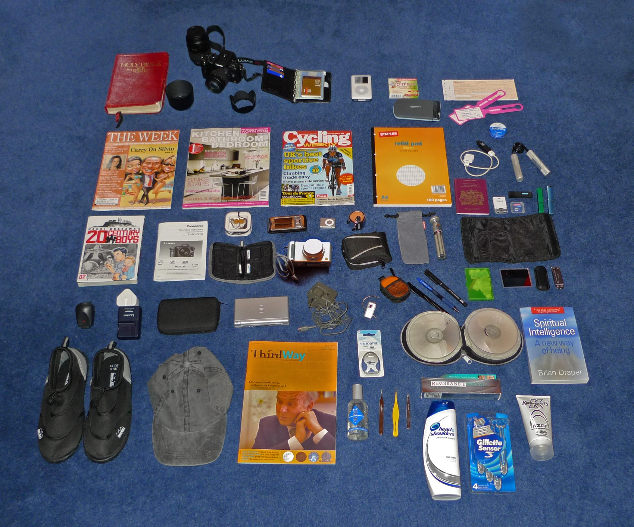 various items from an outdoor activity pack laid out on the floor