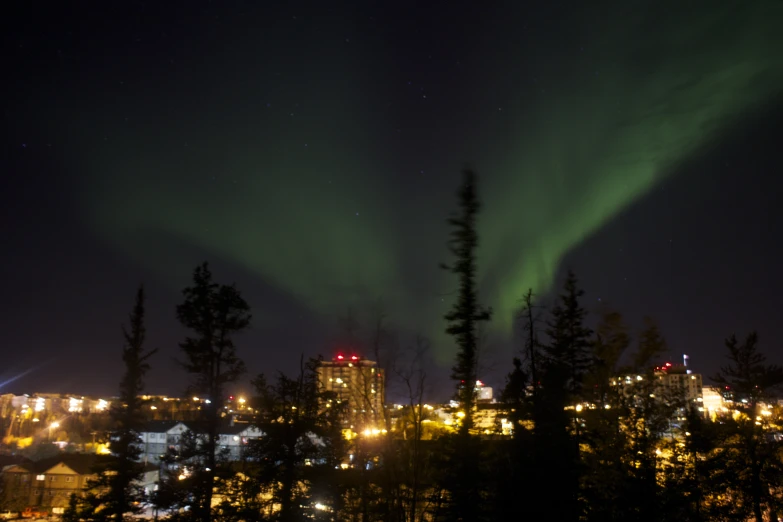 a dark sky with lots of bright lights in the sky