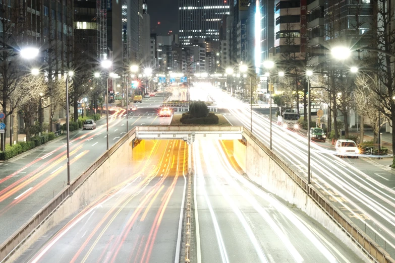 city traffic at night on a crowded freeway