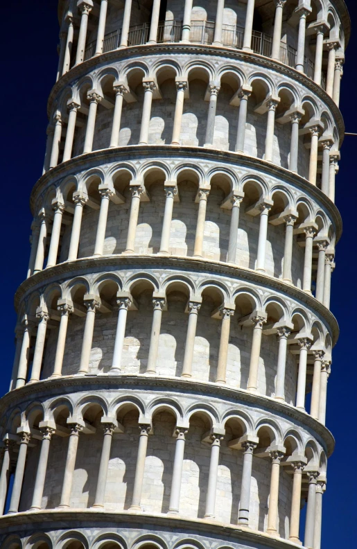 a very tall tower with windows and arches