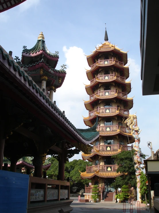 this is a tall pagoda in an asian city