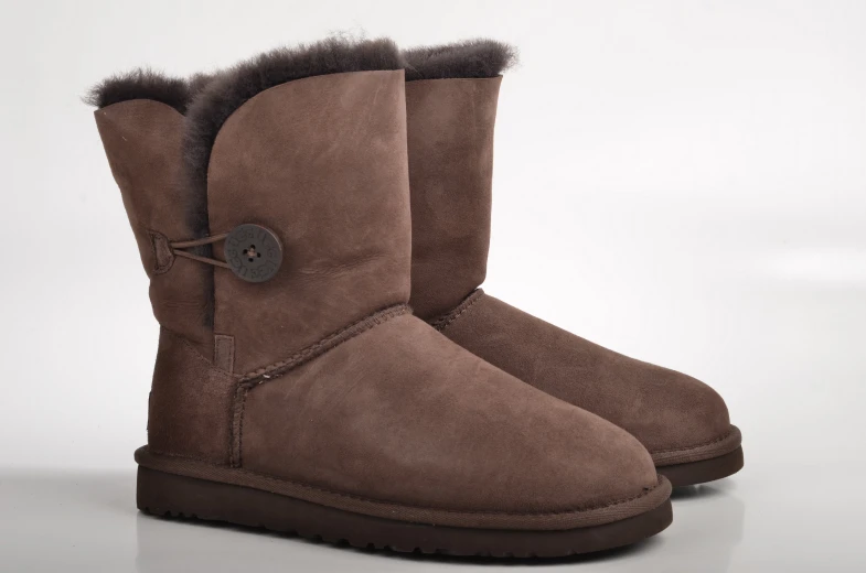a pair of brown suede sheepskin boots