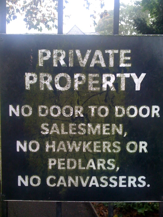 this is a private property sign on a park