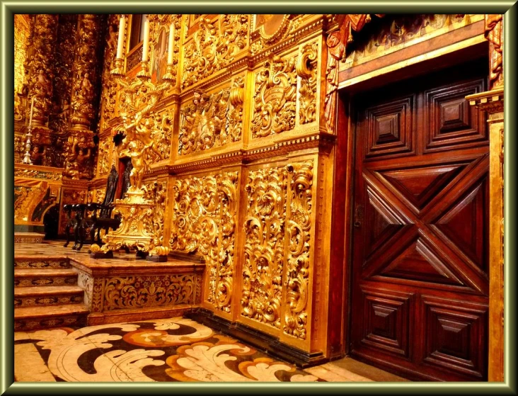 a decorative doorway and steps in an old building