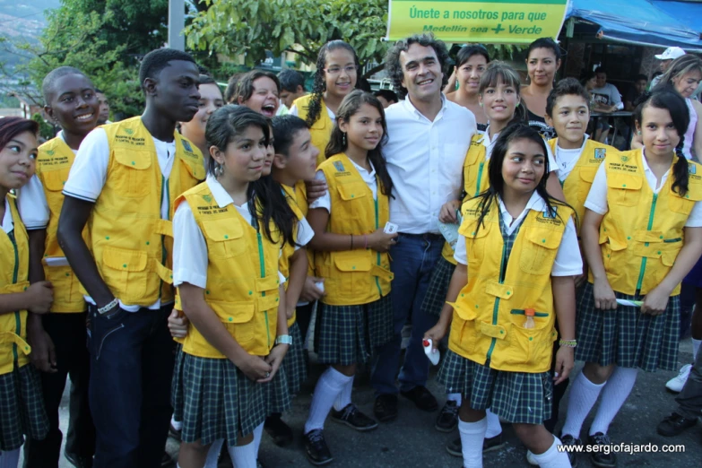 the group of young people is wearing uniforms