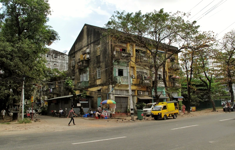 a group of people standing outside a building