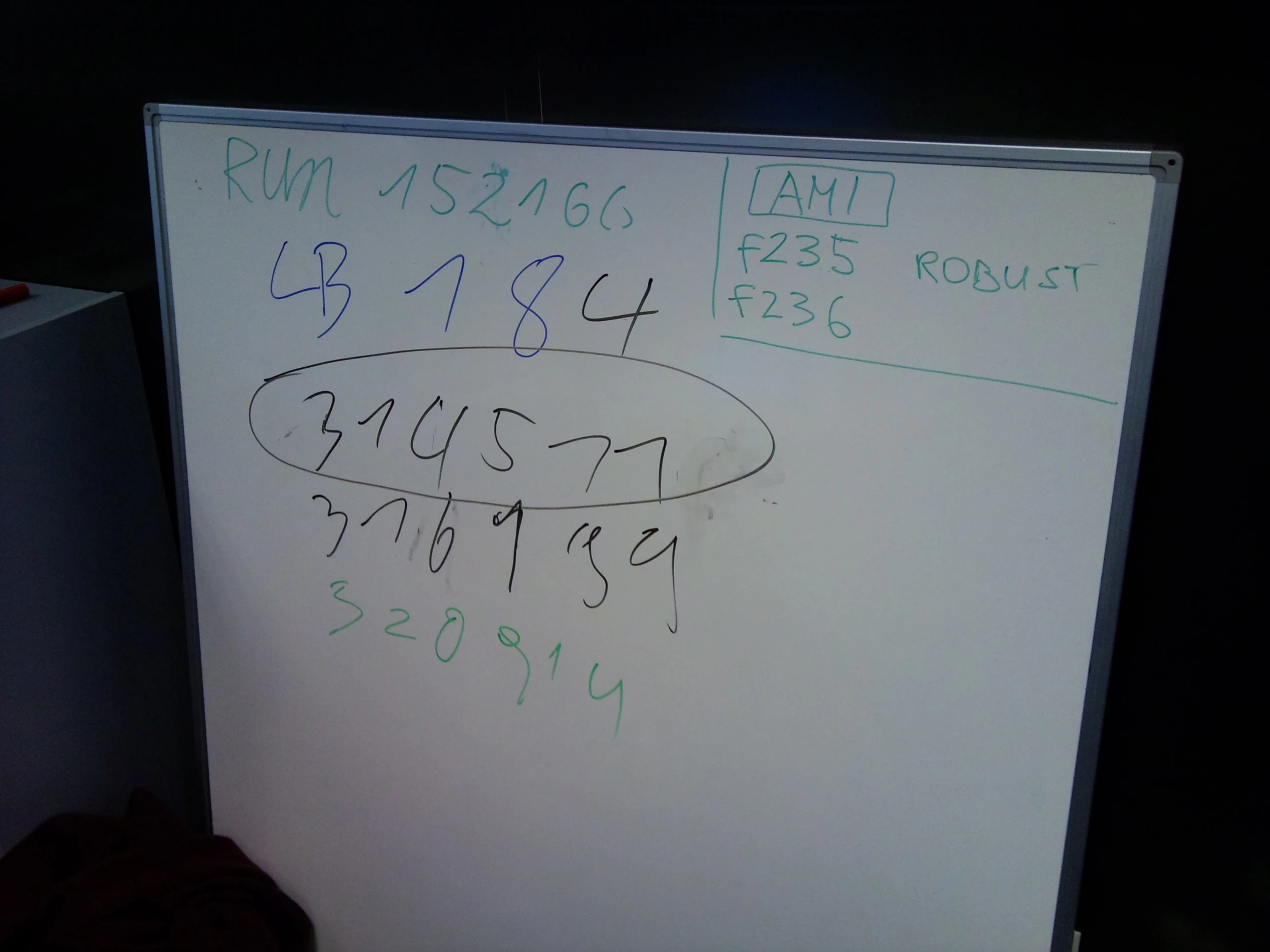 a white board with several different numbers on it
