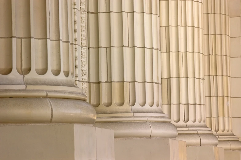 close up of the column capital of an old building