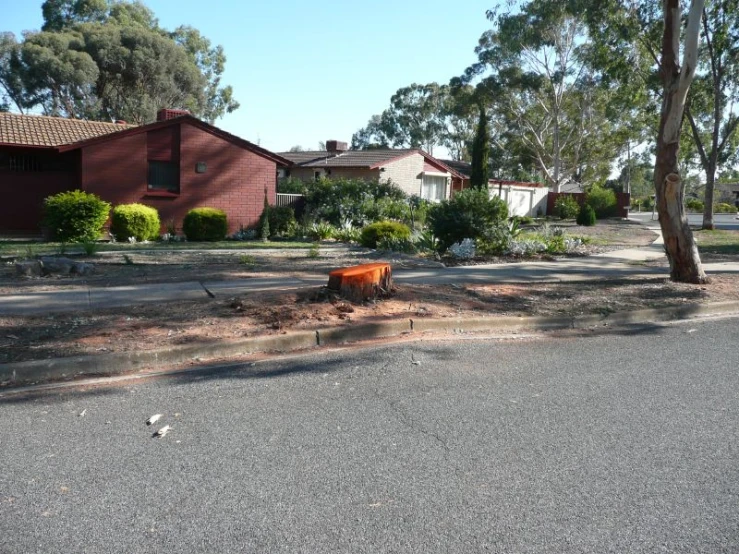 the red house is on the corner of the street