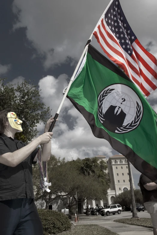 a person with a flag and some building