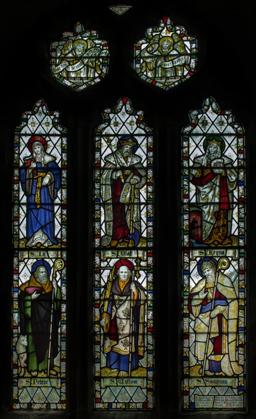 a stain glass window with two large windows