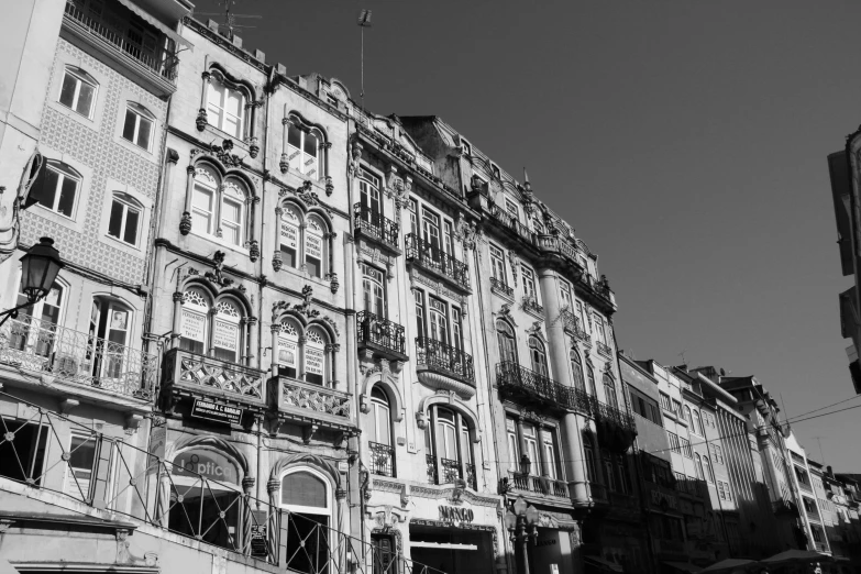 an old building with many balconies on top