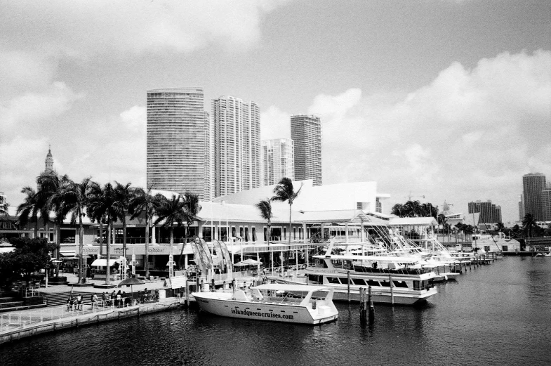 a boat is parked in a harbor beside a building