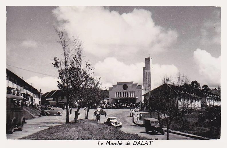 the large building is very big with a clock tower in it