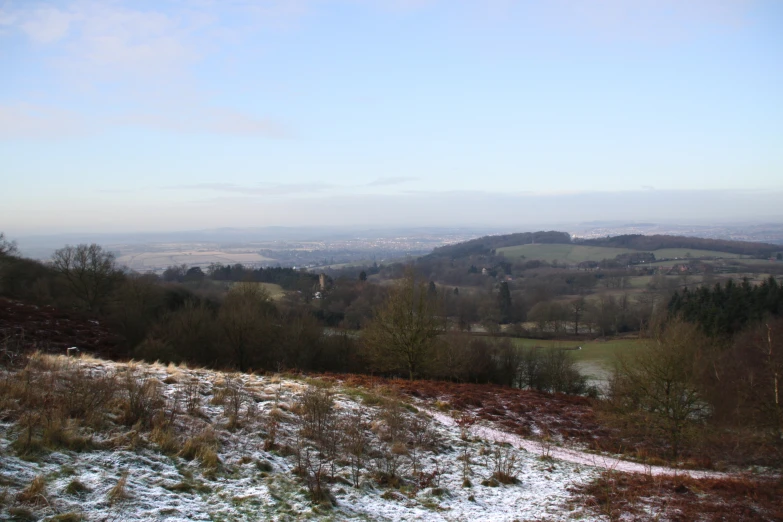 a landscape s of snow covered hills and valleys