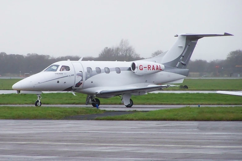 a small plane is sitting on a landing strip