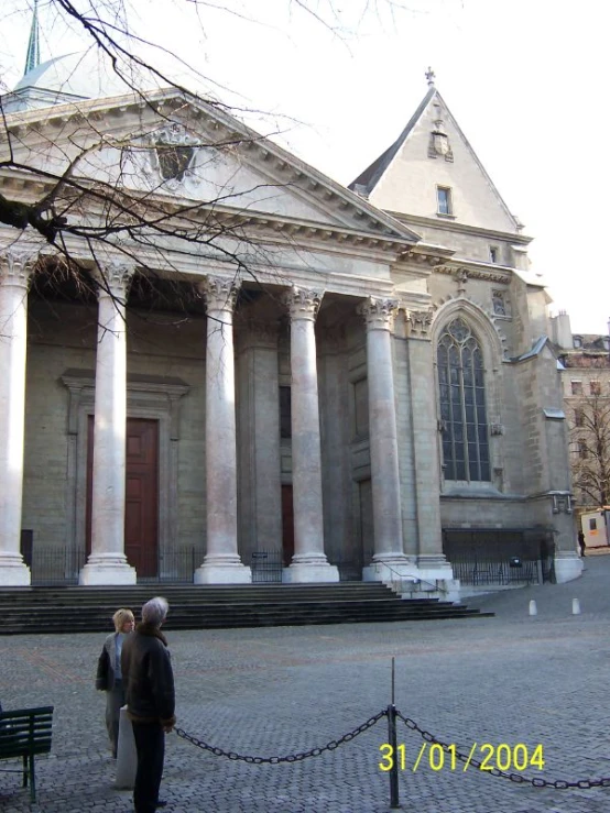 a person standing in front of a church building