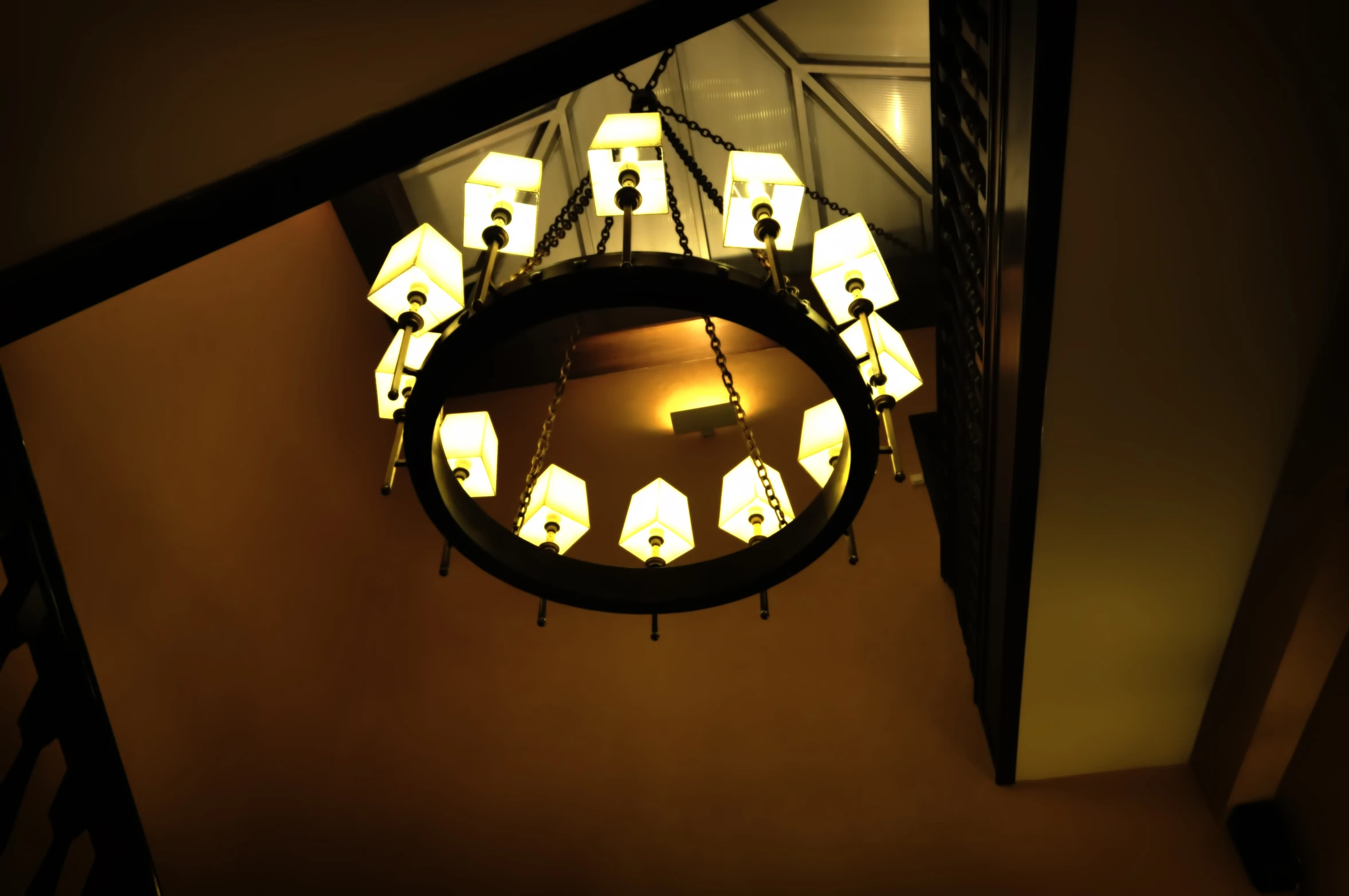a round light fixture with lots of bulbs on it