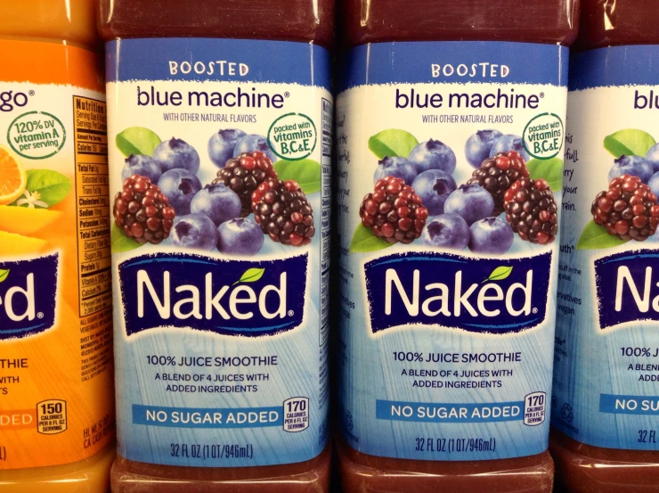 blueberry juice is available for sale in a grocery store