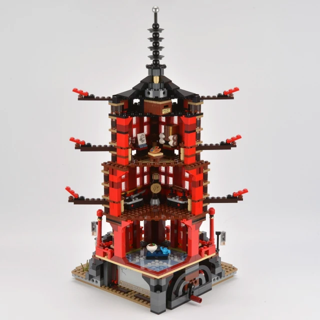 the pagoda has multiple red brick towers