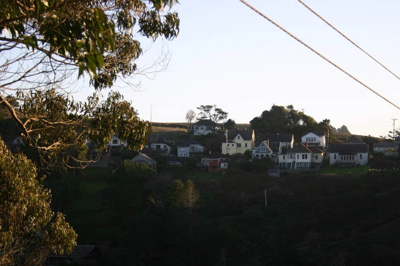 a rural view with lots of houses with power lines above