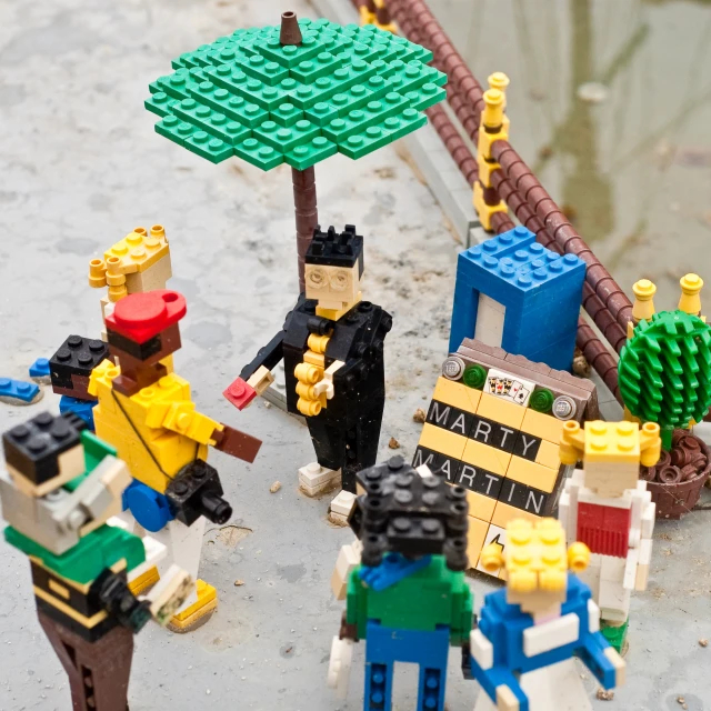 people are playing outside with lego toys made out of legos