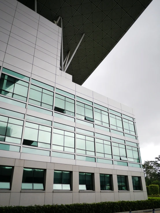 there is an empty building with glass windows