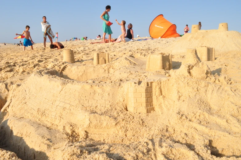 sandcastles on the beach are shaped to look like sand castles