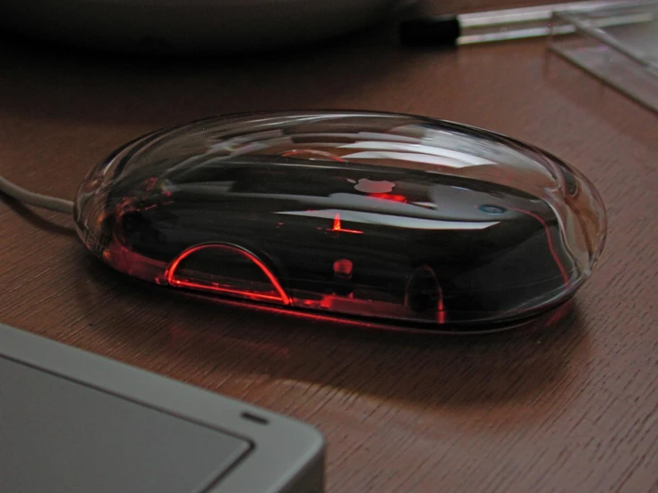 a desk top with a laptop and mouse