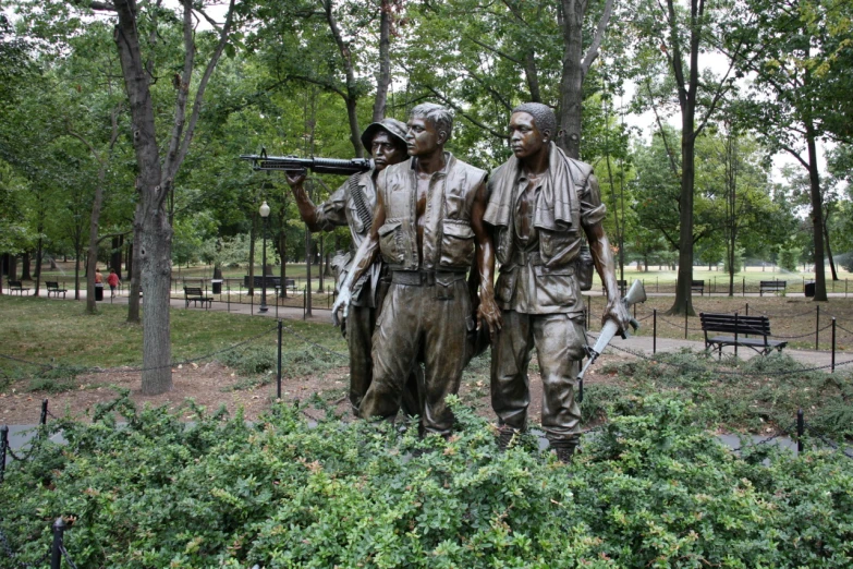 two statues of military men stand next to each other