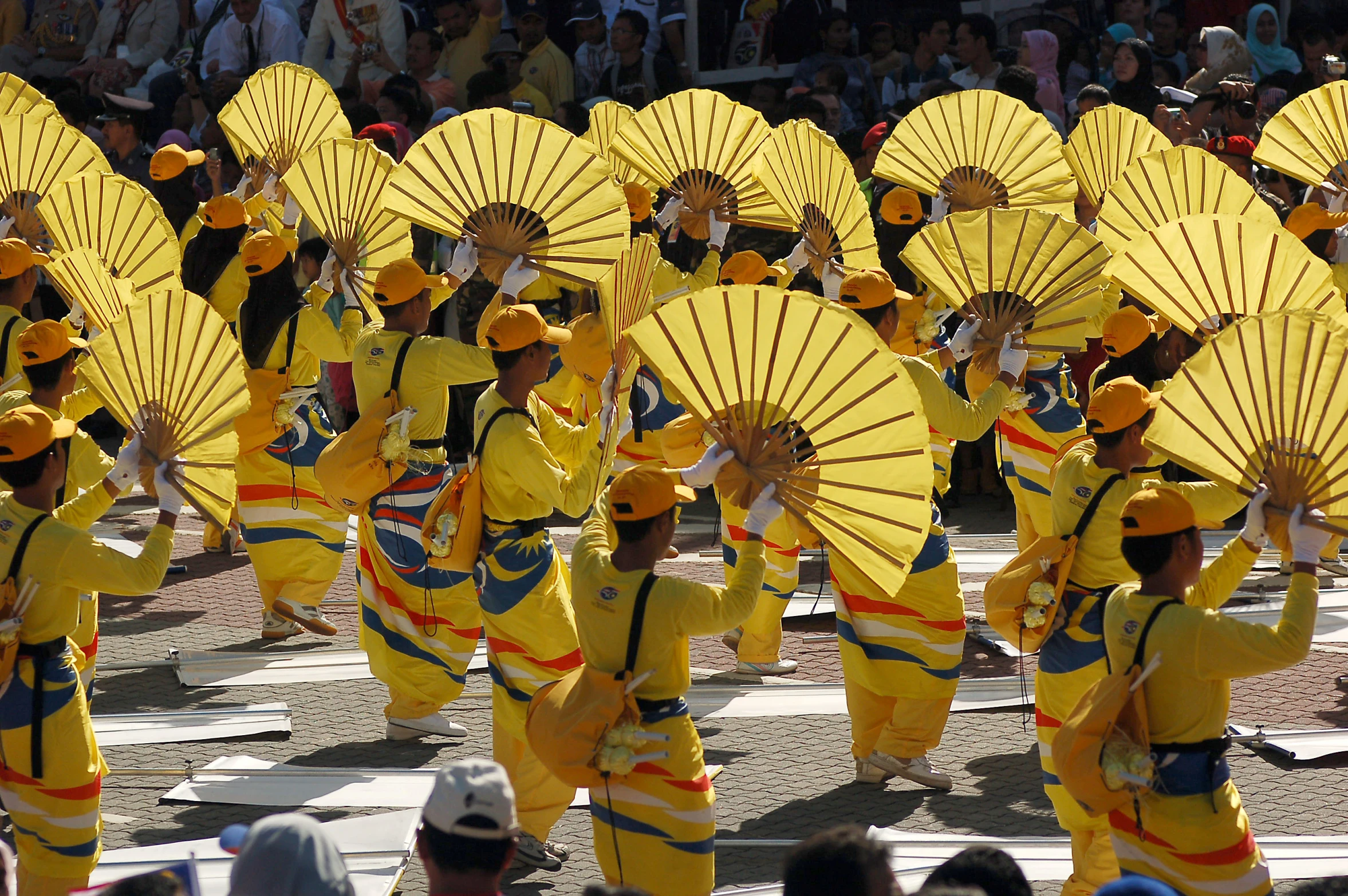 a group of people with costumes are in a parade