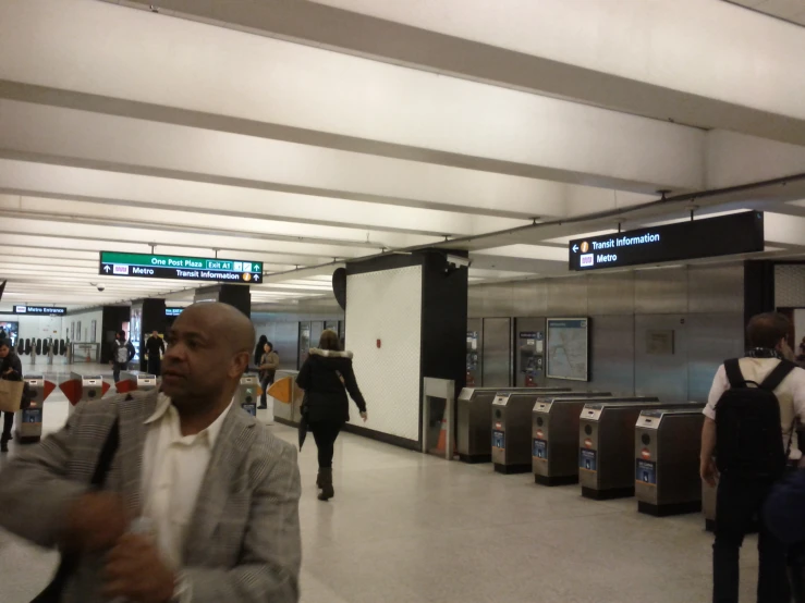 a person is walking through an empty airport