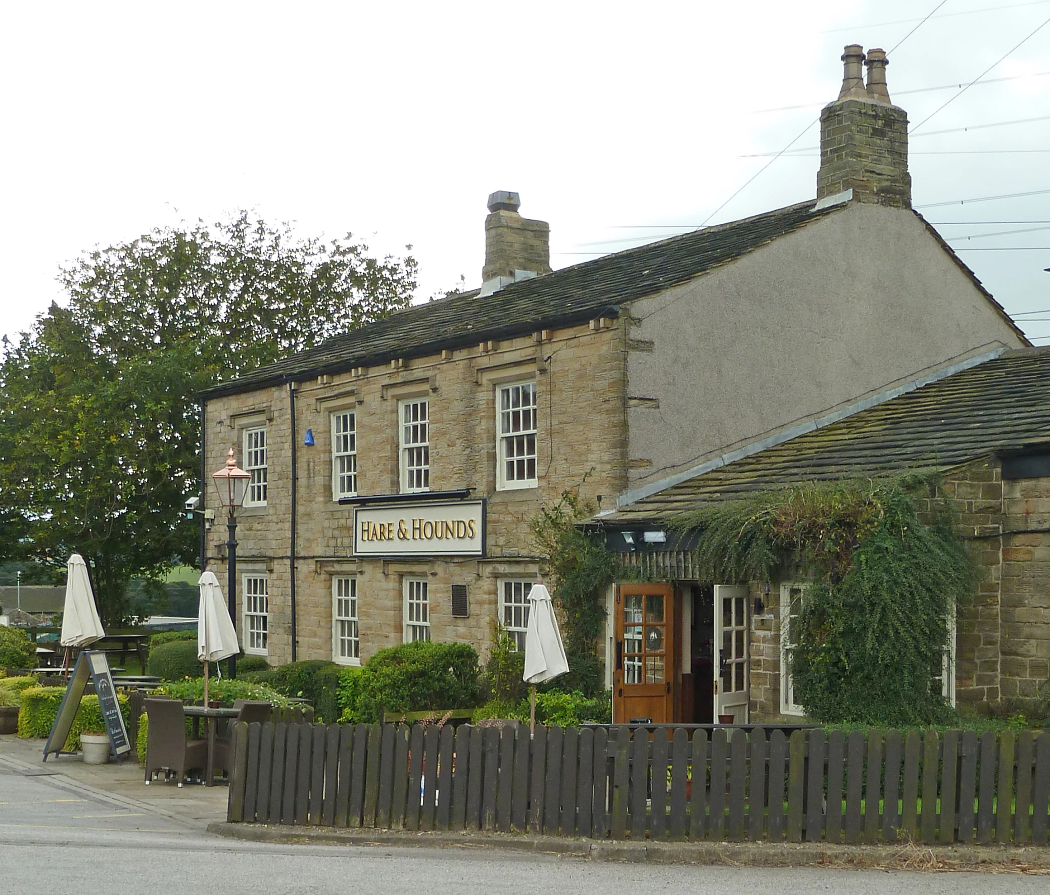 the pub has two buildings on both sides of it