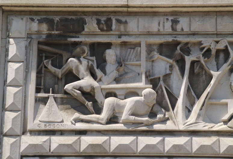 ancient stone carving on a building showing men on the bench, and women holding their arms over the head