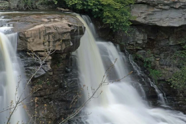 an image of water flowing from the waterfall