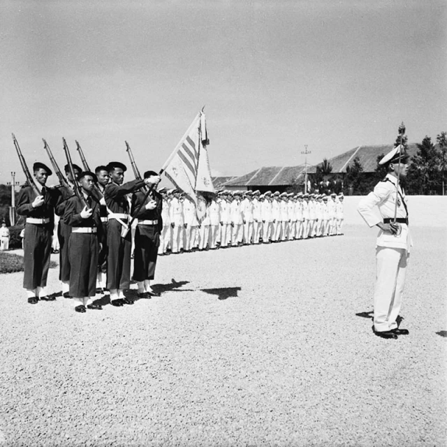 the military band is all dressed in their uniform