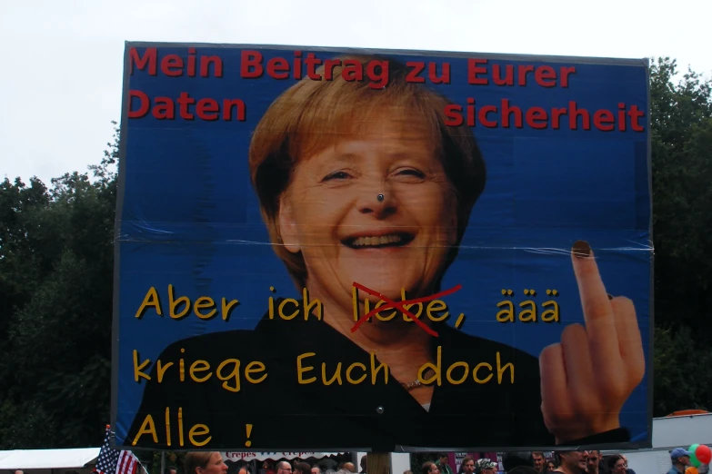the political campaign for germany shows a woman pointing a finger down