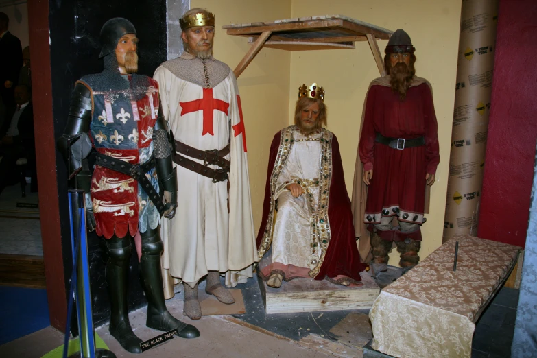 a group of knights dressed as knights standing next to each other