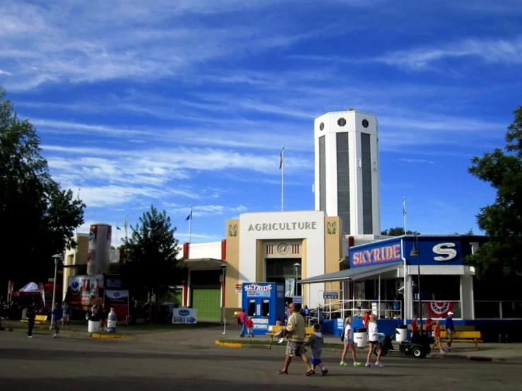 a group of people standing in front of a building