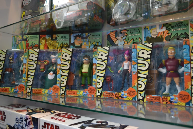 a display case with several action figures for sale