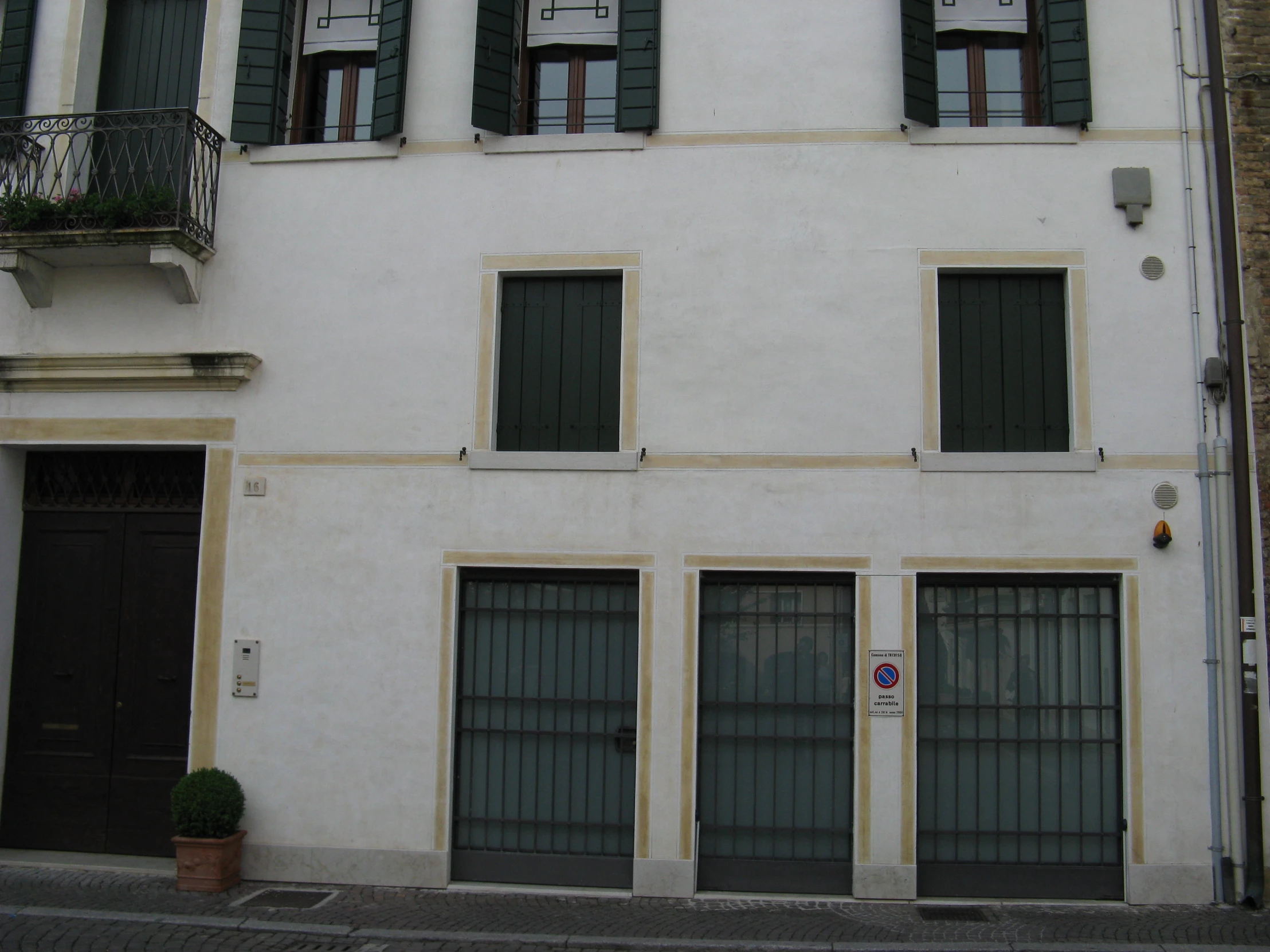 two double windows that are on a building